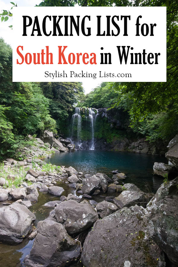 South Korea winter packing list text with a blue waterfall surrounded by green trees. 