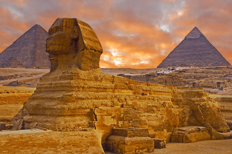Pyramids at sunset in "what to pack for egypt" article