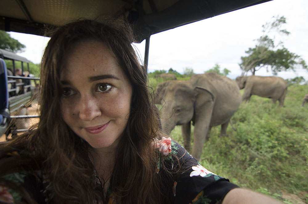 Me ( a woman) taking a selfie with an elephant  in "what to pack for sri lanka" article